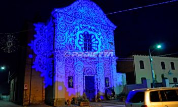 Proiezioni decorative per vestire in luce le facciate delle chiese